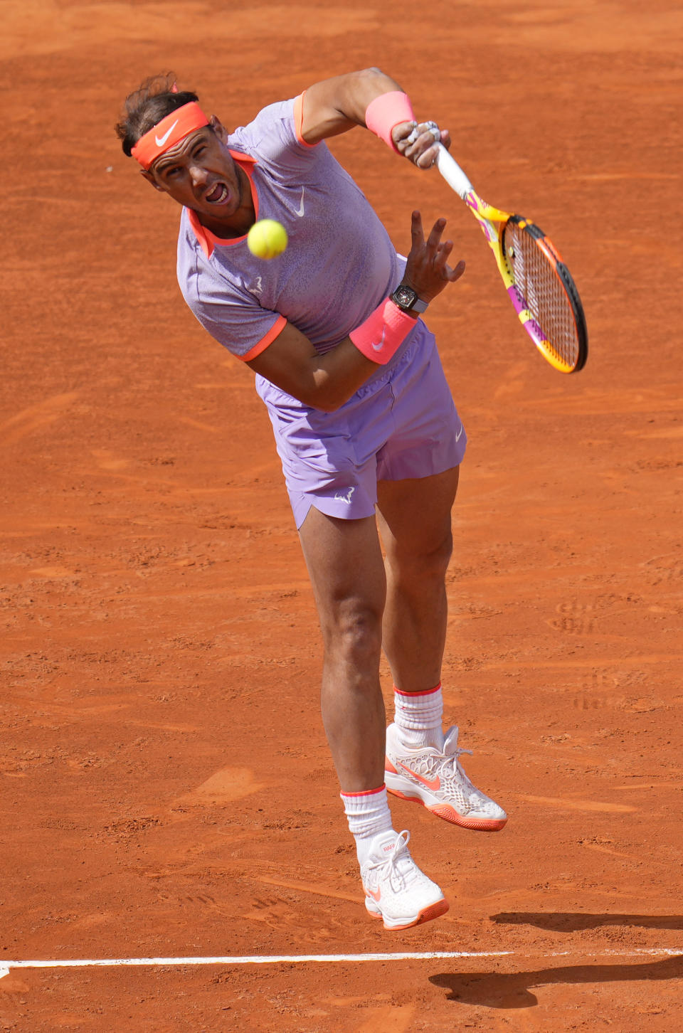 Rafael Nadal of Spain serves to Pedro Cachin of Argentina during the Mutua Madrid Open tennis tournament in Madrid, Spain, Monday, April 29, 2024. (AP Photo/Manu Fernandez)