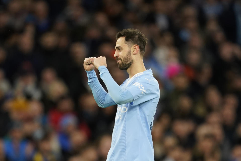 Manchester City's Bernardo Silva celebrates after scoring his side's second goal during the FA Cup quarterfinal soccer match between Manchester City and Newcastle at the Etihad Stadium in Manchester, England, Saturday, March 16, 2024. (AP Photo/Dave Thompson, Pool)