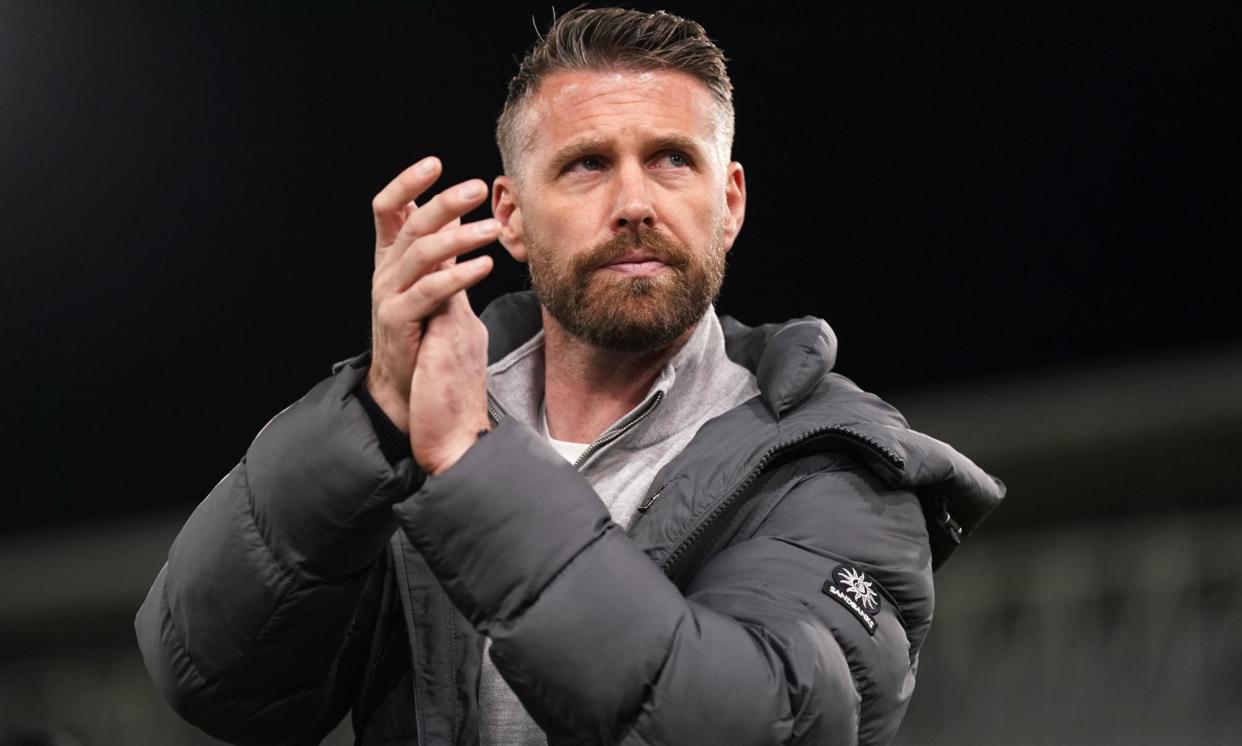 <span>Rob Edwards applauds the fans after the final whistle.</span><span>Photograph: Bradley Collyer/PA</span>