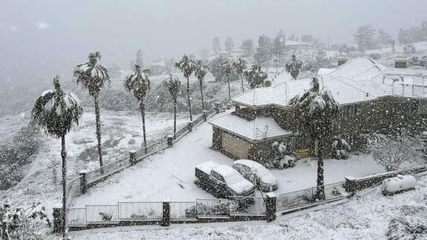 PHOTO: Snow blankets a home in Rancho Cucamonga, Calif., on Feb. 25, 2023. (Josh Edelson/AFP via Getty Images)