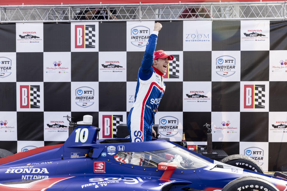 Chip Ganassi Racing driver Alex Palou (10) celebrates on Victory Lane after winning the Honda Indy Grand Prix of Alabama auto race at Barber Motorsports Parkway, Sunday, April 18, 2021, in Birmingham, Ala. (AP Photo/Vasha Hunt)