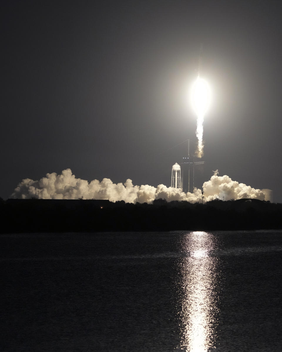 A SpaceX Falcon 9 rocket with the crew capsule Endeavour lifts off from pad 39A at the Kennedy Space Center in Cape Canaveral, Fla., Thursday, March 2, 2023. (AP Photo/John Raoux)