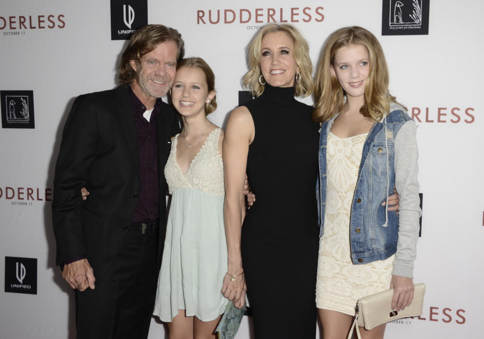 William H. Macy, and from left, Grace Macy, Felicity Huffman and Sophia Macy arrive at the Los Angeles VIP screening of "Rudderless" at The Vista Theater on Tuesday, Oct. 7, 2014. (Photo by Dan Steinberg/Invision/AP)