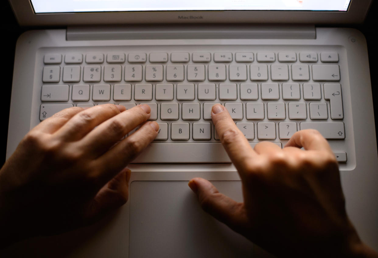 File photo dated 06/08/13 of a person using a laptop. More people than ever were regular internet users in 2020, new figures show. New data from the Office for National Statistics (ONS) shows that 92% of all UK adults have recently been online, up from 91% in 2019. Issue date: Tuesday April 6, 2021.