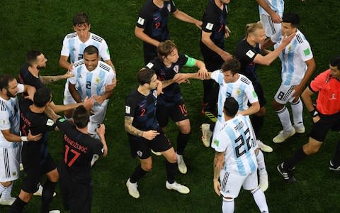 Croatia's players argue with Argentina's players after a foul on Croatia's midfielder Ivan Rakitic - Credit: KIRILL KUDRYAVTSEV/AFP/Getty Images