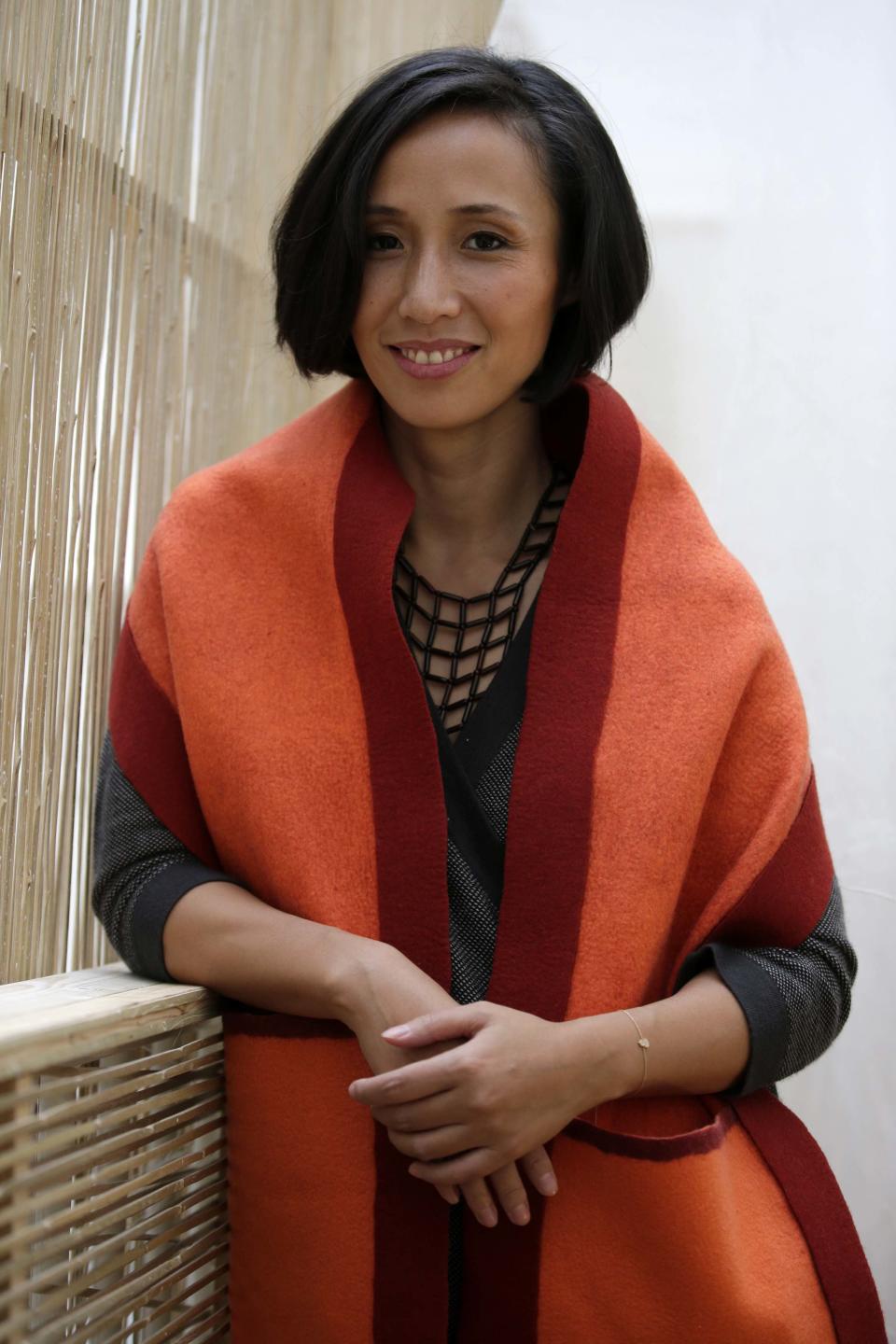 Jiang Qiong Er, Shang Xia's artistic director and chief executive, poses during a Chinese tea ceremony in Paris