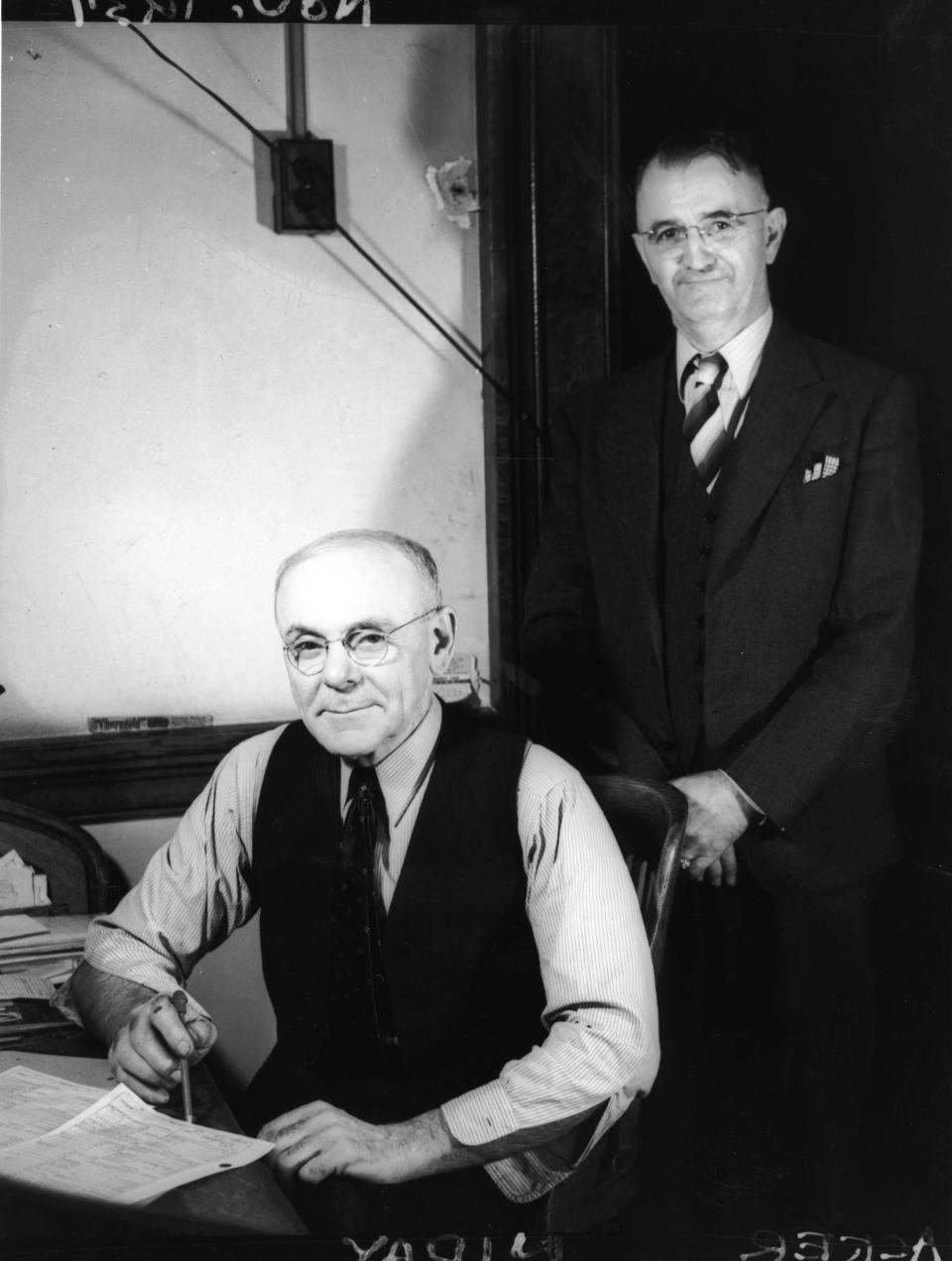 Emory Niday (seated), was the assistant postmaster in 1929.