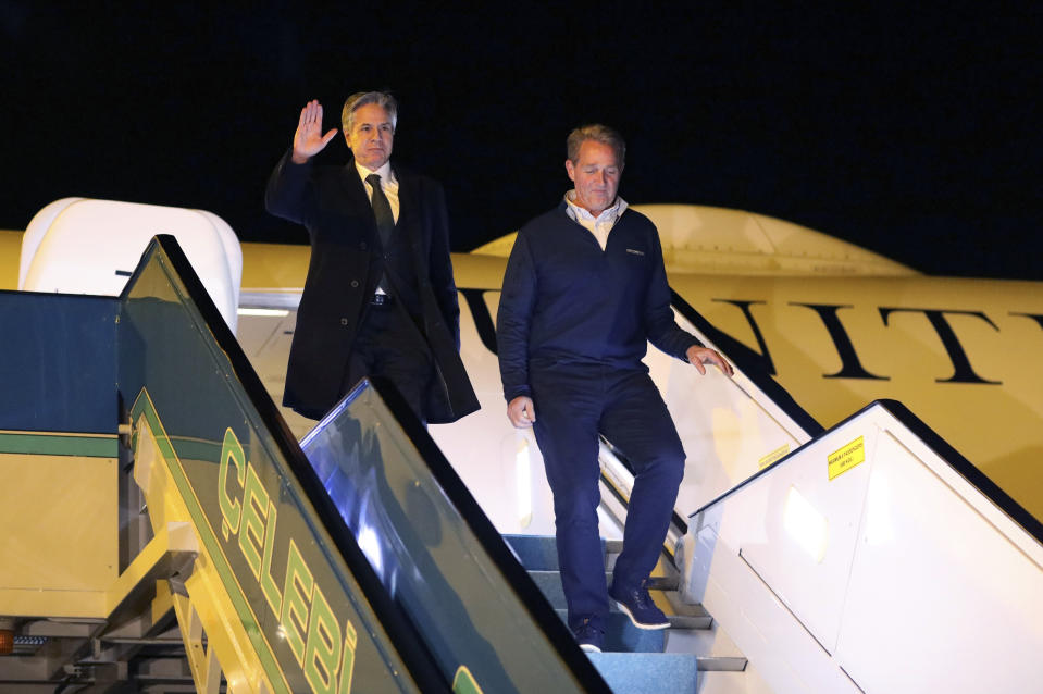 U.S. Secretary of State Antony Blinken, left, disembarks his plane upon arrival at Esenboga Airport in Ankara, Turkey, Sunday, Feb. 19, 2023. Blinken has taken a helicopter tour of one of the provinces worst-affected by the Feb. 6 earthquake in southern Turkey and northern Syria. The secretary of state is making his first trip to NATO ally Turkey since he took office. Blinken arrived at Incirlik Air Base on Sunday after attending the Munich Security Conference in Germany. (AP Photo/Burhan Ozbilici)