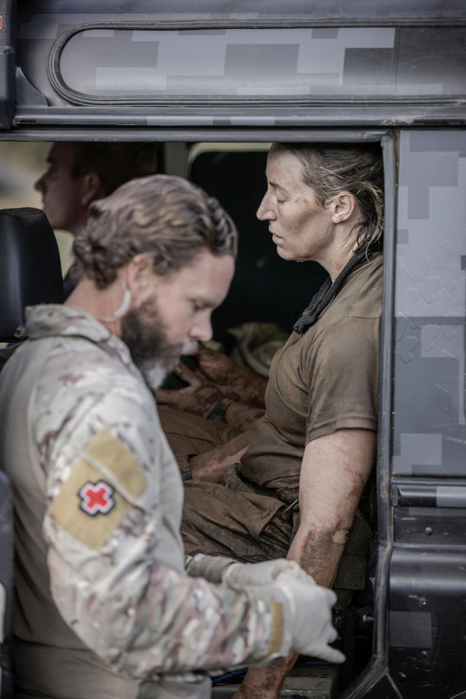 SAS Australia star Jana Pittman receives medical attention after collapsing in episode 12. Photo: Channel 7.