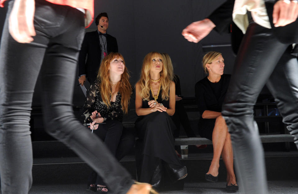 Designer Rachel Zoe, center, watches a rehearsal before her spring 2013 collection is shown at Fashion Week, Wednesday, Sept. 12, 2012, in New York. (Photo by Diane Bondareff/Invision/AP)