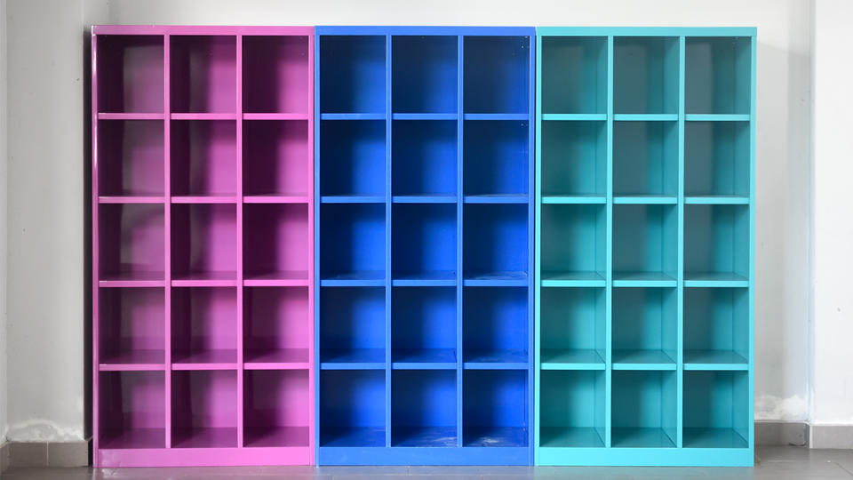 3 colorful bookshelves empty of books; bookshelf organization