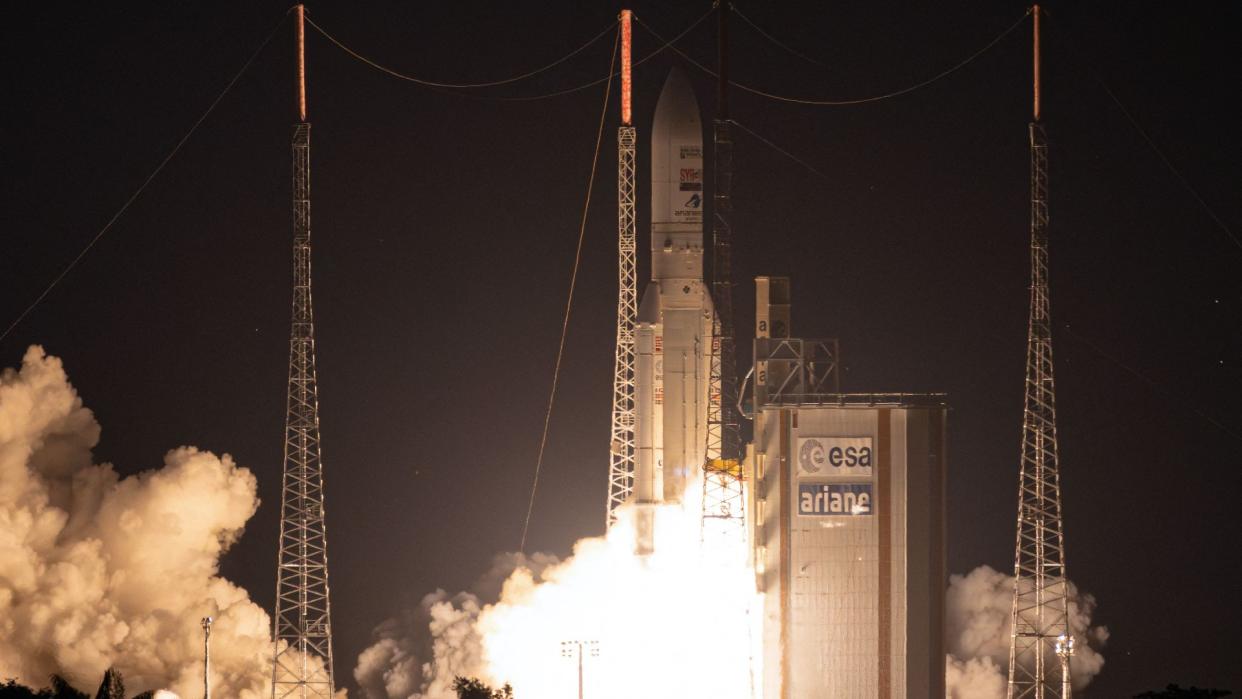  a rocket launches at night 