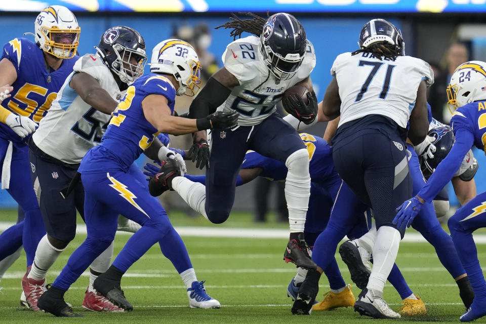 Tennessee Titans running back Derrick Henry (22) runs against the Los Angeles Chargers during the second half of an NFL football game in Inglewood, Calif., Sunday, Dec. 18, 2022. (AP Photo/Ashley Landis)
