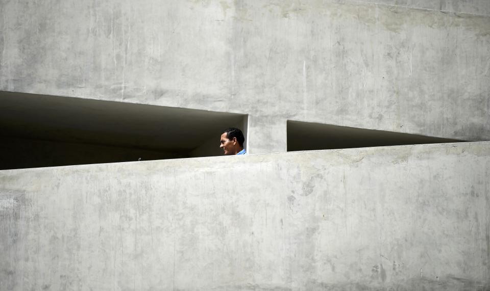 A workers strolls down some stairs at the Dunas arena soccer stadium in Natal, June 12 , 2014. Mexico will face Cameroon in their 2014 World Cup football match here on June 13. REUTERS/Dylan Martinez