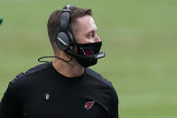 Arizona Cardinals head coach Kliff Kingsbury watches during the first half of an NFL football game against the Detroit Lions, Sunday, Sept. 27, 2020, in Glendale, Ariz. (AP Photo/Ross D. Franklin)