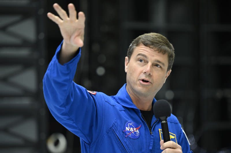 NASA's Artemis II commander Reid Wiseman responds to questions from the media while visiting the Orion spacecraft Tuesday at Kennedy Space Center in Florida as it is being prepared for his mission planned for late 2024. Photo by Joe Marino/UPI