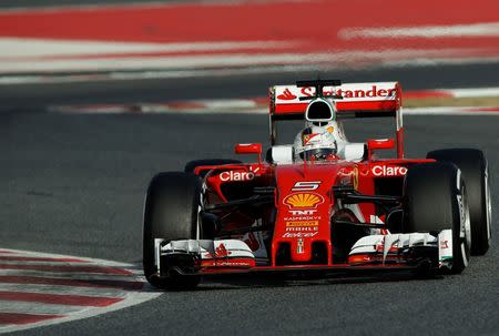 Ferrari Formula One driver Sebastian Vettel of Germany takes a curve with his car during the second testing session ahead of the upcoming season at the Circuit Barcelona-Catalunya in Montmelo, Spain, February 23, 2016. REUTERS/Sergio Perez