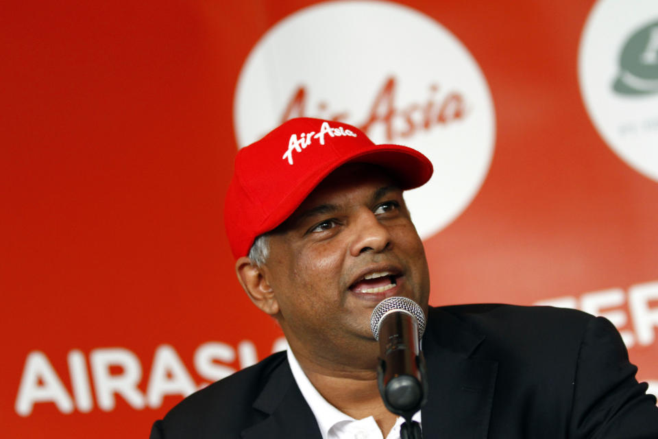 AirAsia Chief Executive Officer Tony Fernandez speaks during a joint press conference with Batavia Air President Director Yudiawan Tansari, unseen, in Jakarta, Indonesia, Thursday, July 26, 2012. Low-cost airline AirAsia said it is buying Indonesian budget carrier Batavia Air to expand in Southeast Asia's biggest economy. (AP Photo/Achmad Ibrahim)