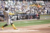 Pittsburgh Pirates' Andrew McCutchen hits a single during the third inning of a baseball game against the Milwaukee Brewers Wednesday, May 15, 2024, in Milwaukee. (AP Photo/Morry Gash)