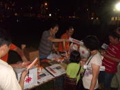 Souvenirs and merchandise were sold at the NSP rally to raise funds for the party. (Yahoo! photo/ Fann Sim)