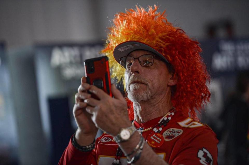 Kansas City Chiefs fan Michael Hurts takes photos at the NFL Draft Experience Thursday, April 27, 2023, at the National WWI Museum and Memorial in Kansas City.