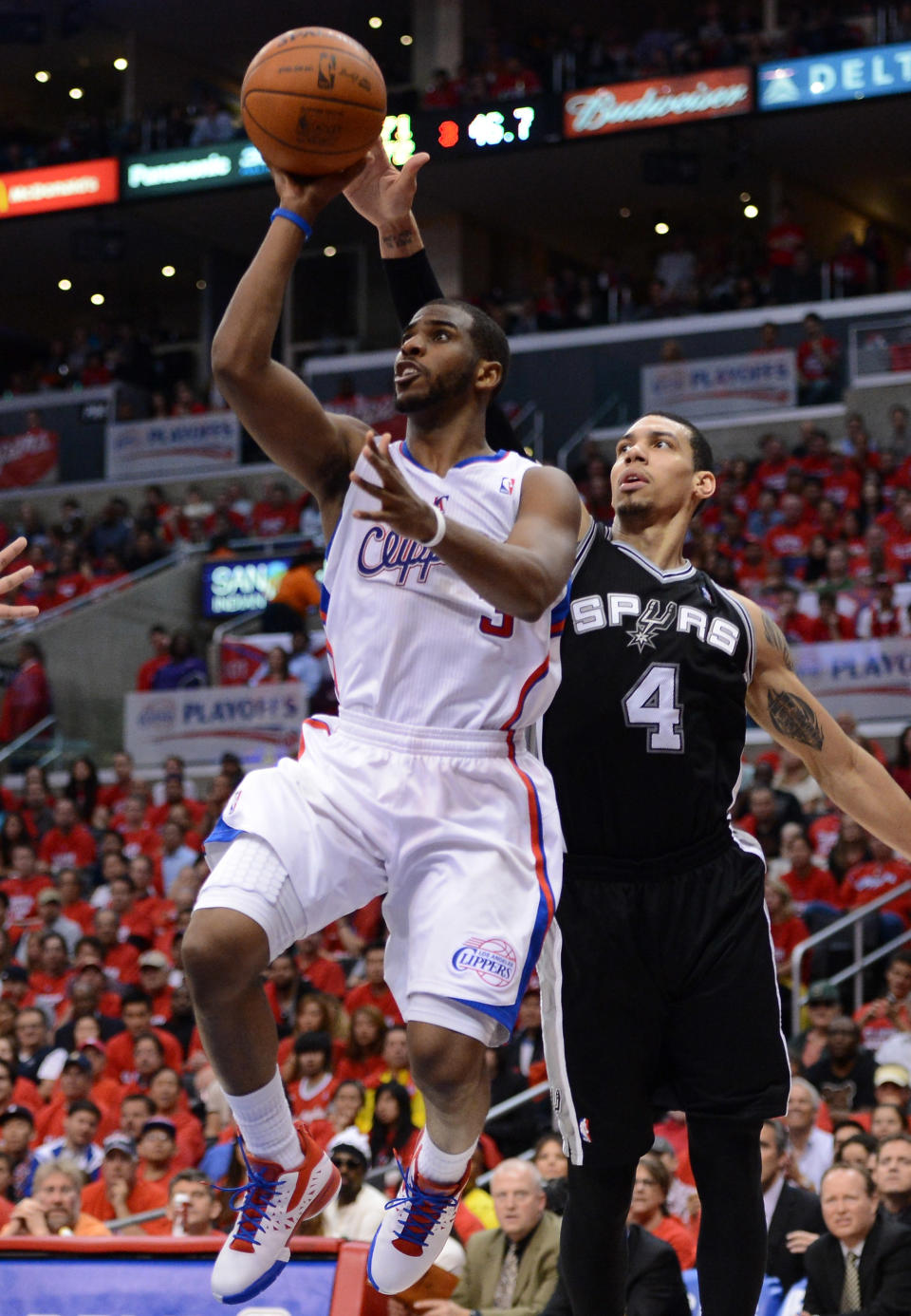 LOS ANGELES, CA - MAY 20: Chris Paul #3 of the Los Angeles Clippers goes up for a shot in front of Danny Green #4 of the San Antonio Spurs in the second half in Game Four of the Western Conference Semifinals in the 2012 NBA Playoffs on May 20, 2011 at Staples Center in Los Angeles, California. NOTE TO USER: User expressly acknowledges and agrees that, by downloading and or using this photograph, User is consenting to the terms and conditions of the Getty Images License Agreement. (Photo by Harry How/Getty Images)