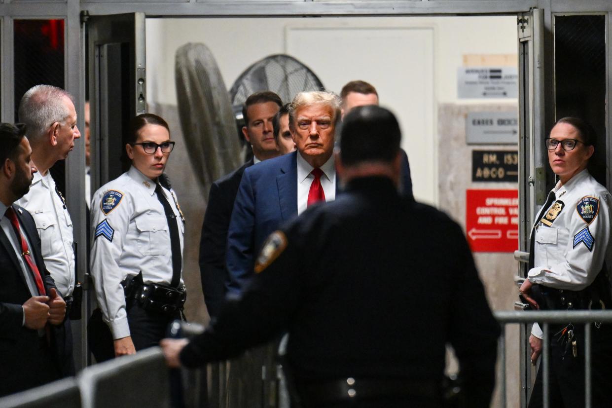 Former President Donald Trump arrives at a criminal court in New York City on April 15, 2024.