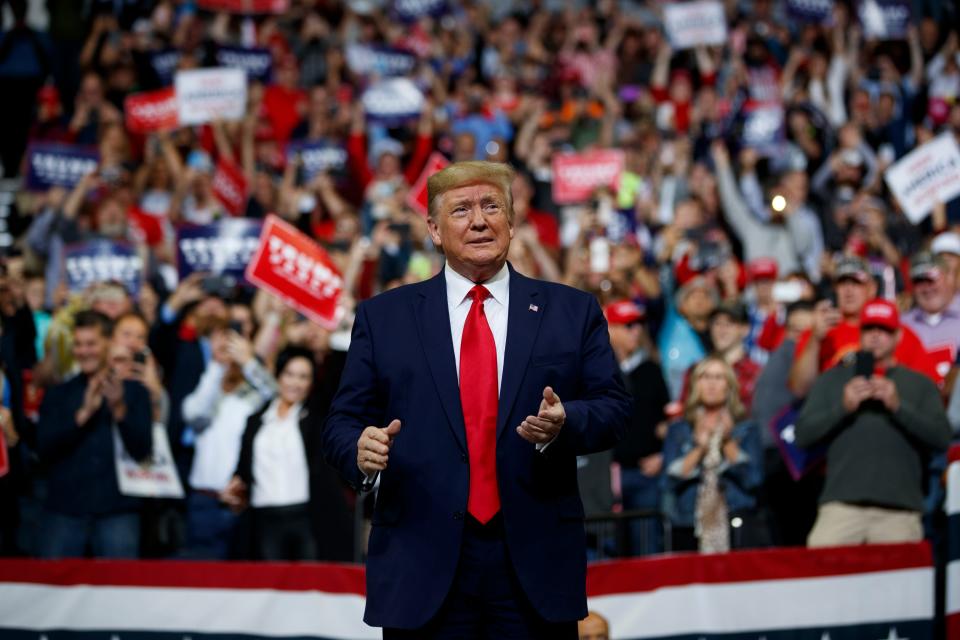 President Donald Trump arrives to speak at a campaign rally at the Target Center, Thursday, Oct. 10, 2019, in Minneapolis. (AP Photo/Evan Vucci)