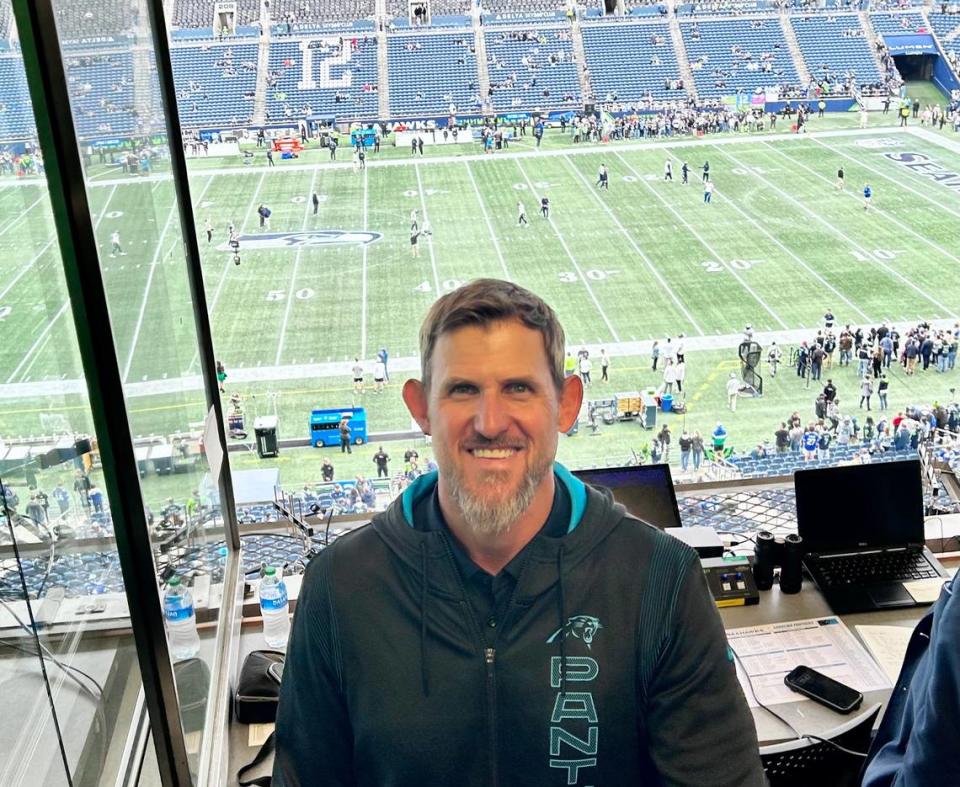 Jordan Gross, a member of the Carolina Panthers’ Hall of Honor, in the team’s radio booth on Sept. 24, 2023, in Seattle. Gross used to call several games a year on the radio for the Panthers, but in 2023 has cut that number down to just one. He is busy coaching his high school alma mater in rural Idaho -- the Fruitland Grizzlies.