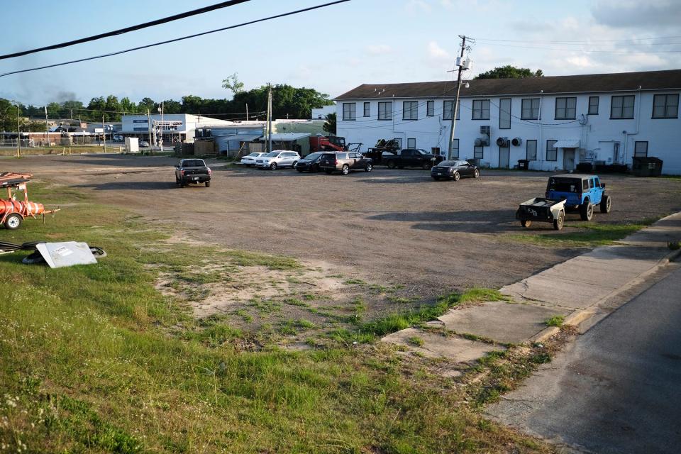 A lot designated for public parking has yet to be paved in historic downtown Crestview.