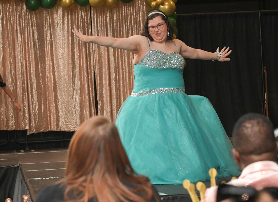 Kathleen Stoller poses on the catwalk during the 6th annual Area 14 Anderson County Special Olympics 2024 You Are Beautiful Pageant at the Civic Center in Anderson, S.C. Thursday, January 18, 2024.