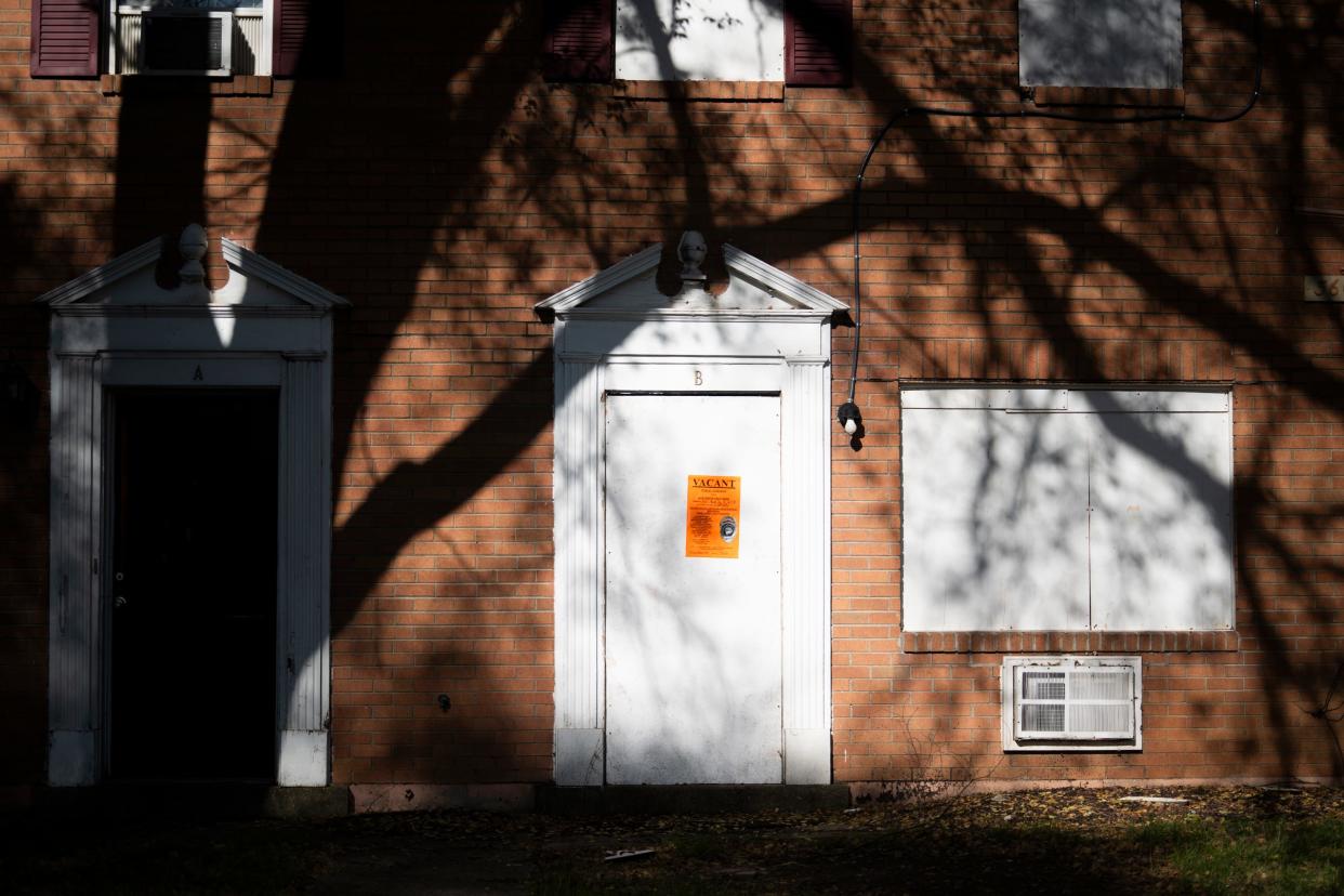 More than 850 Haitian immigrants are living in mostly abandoned apartments in Colonial Village on the East Side. Residents say they were scammed into paying $1,200 for two-bedroom apartments without heat, hot water, and electricity.