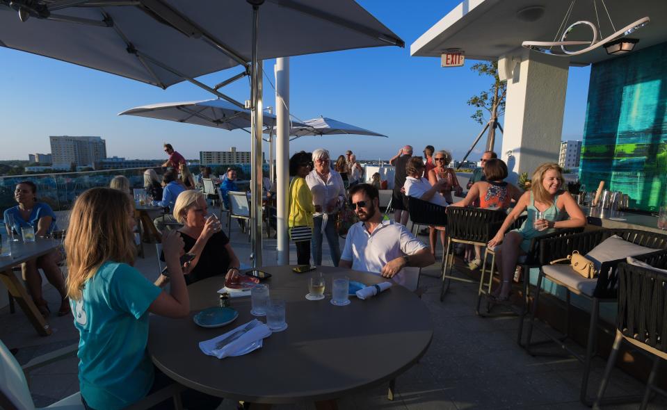 Art Ovation Hotel's Perspective Rooftop Pool Bar, pictured here, will host New Year's Eve Dance on Water.