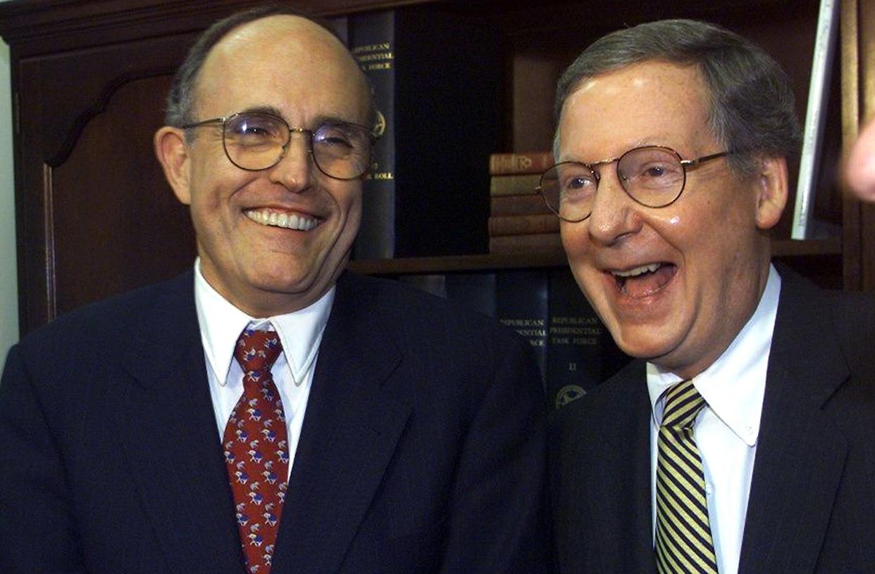 Rudy Giuliani and Senate Majority Leader Mitch McConnell at a Republican party fundraiser in 1999. (Photo: New York Daily News Archive via Getty Images)