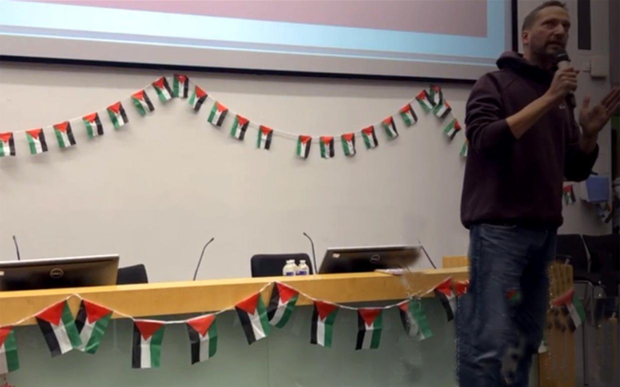 Dr Ranjeet Brar speaking at an event hosted by City Friends of Palestine