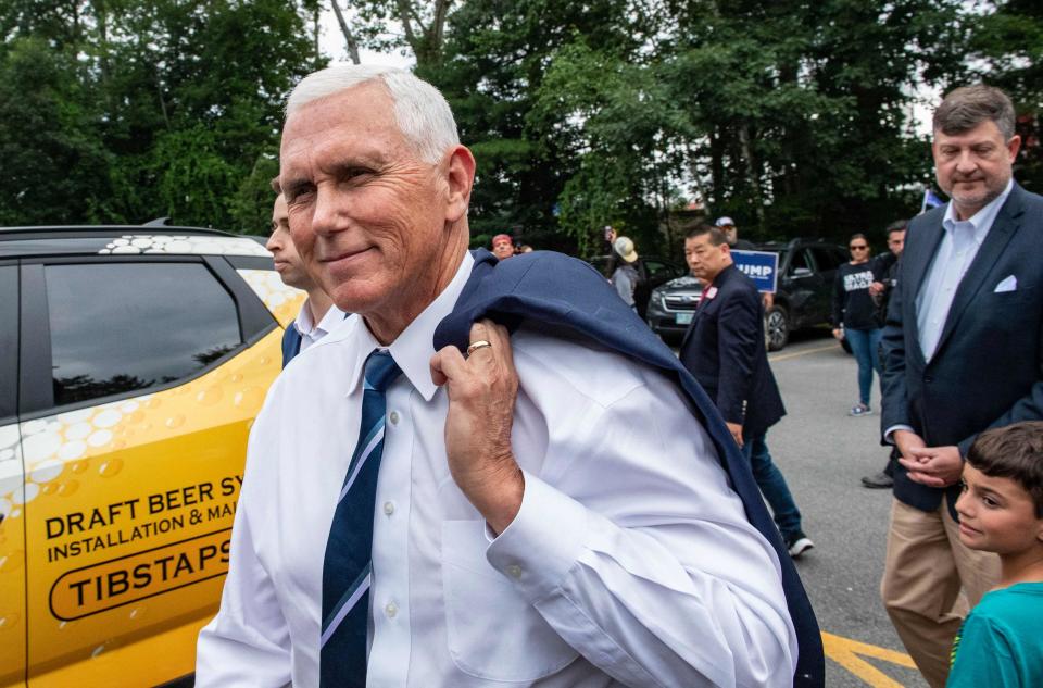 US Presidential hopeful and former Vice President Mike Pence arrives at a campaign event at American Legion Hall Post 27 in Londonderry, New Hampshire, on August 4, 2023.