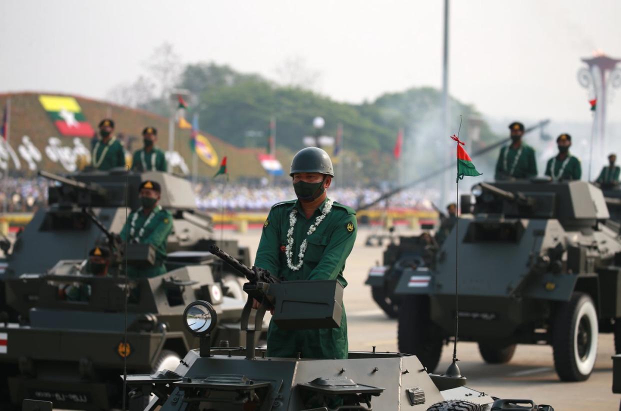 <span class="caption">Every March 27, the Myanmar military celebrates its anniversary with a parade. The day of the 2021 parade, soldiers killed at least 90 pro-democracy protesters.</span> <span class="attribution"><a class="link " href="https://www.gettyimages.com/detail/news-photo/march-27-2021-military-vehicles-march-in-a-formation-during-news-photo/1231981232?adppopup=true" rel="nofollow noopener" target="_blank" data-ylk="slk:Xinhua/Zhang Dongqiang via Getty Images;elm:context_link;itc:0;sec:content-canvas">Xinhua/Zhang Dongqiang via Getty Images</a></span>