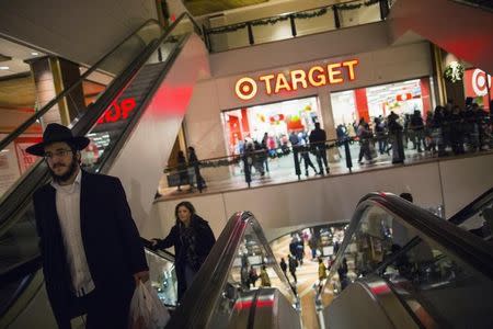 Shoppers are seen at a Target store during Black Friday sales in the Brooklyn borough of New York, November 29, 2013. REUTERS/Eric Thayer