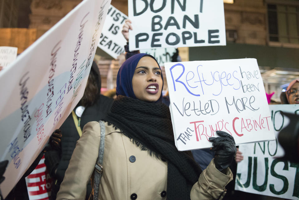 A woman in the crowd chants in opposition to the Muslim Ban in New York City on Feb. 11, 2017.