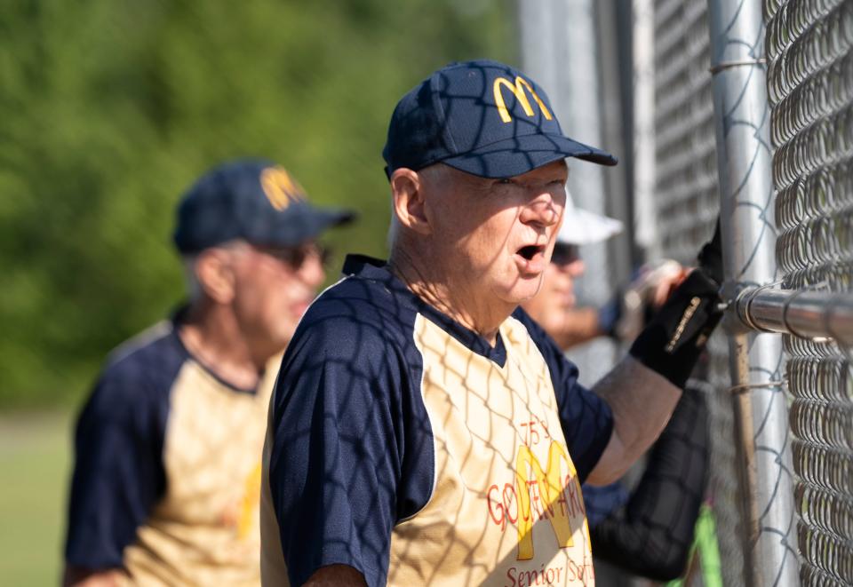 Jul 11, 2023; Hilliard, Ohio, USA;  Chuck Hodgkiss shouts to a teammate during the Tuesday match of the Central Ohio Senior Softball Association at the Roger A. Reynolds Municipal Park. 