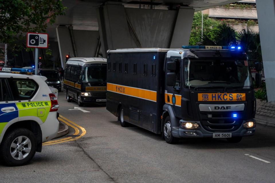 A truck believed to be carrying Jimmy Lai arrives at West Kowloon Magistrates’ Court on Monday. His son said he had no chance of a fair trial (Copyright 2023 The Associated Press. All rights reserved.)