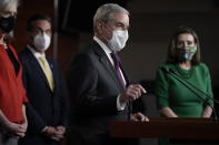 House Budget Committee Chairman John Yarmuth, D-Ky., speaks meets with reporters before the House votes to pass a $1.9 trillion pandemic relief package, during a news conference at the Capitol in Washington, Friday, Feb. 26, 2021. House Speaker Nancy Pelosi of Calif., is at right. (AP Photo/J. Scott Applewhite)