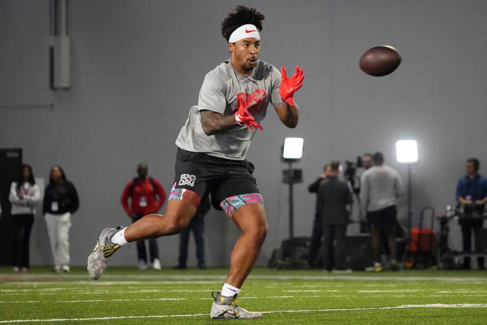 Mar 20, 2024; Columbus, Ohio, USA; Ohio State Buckeyes linebacker Steele Chambers catches a ball during Pro Day at the Woody Hayes Athletic Center.