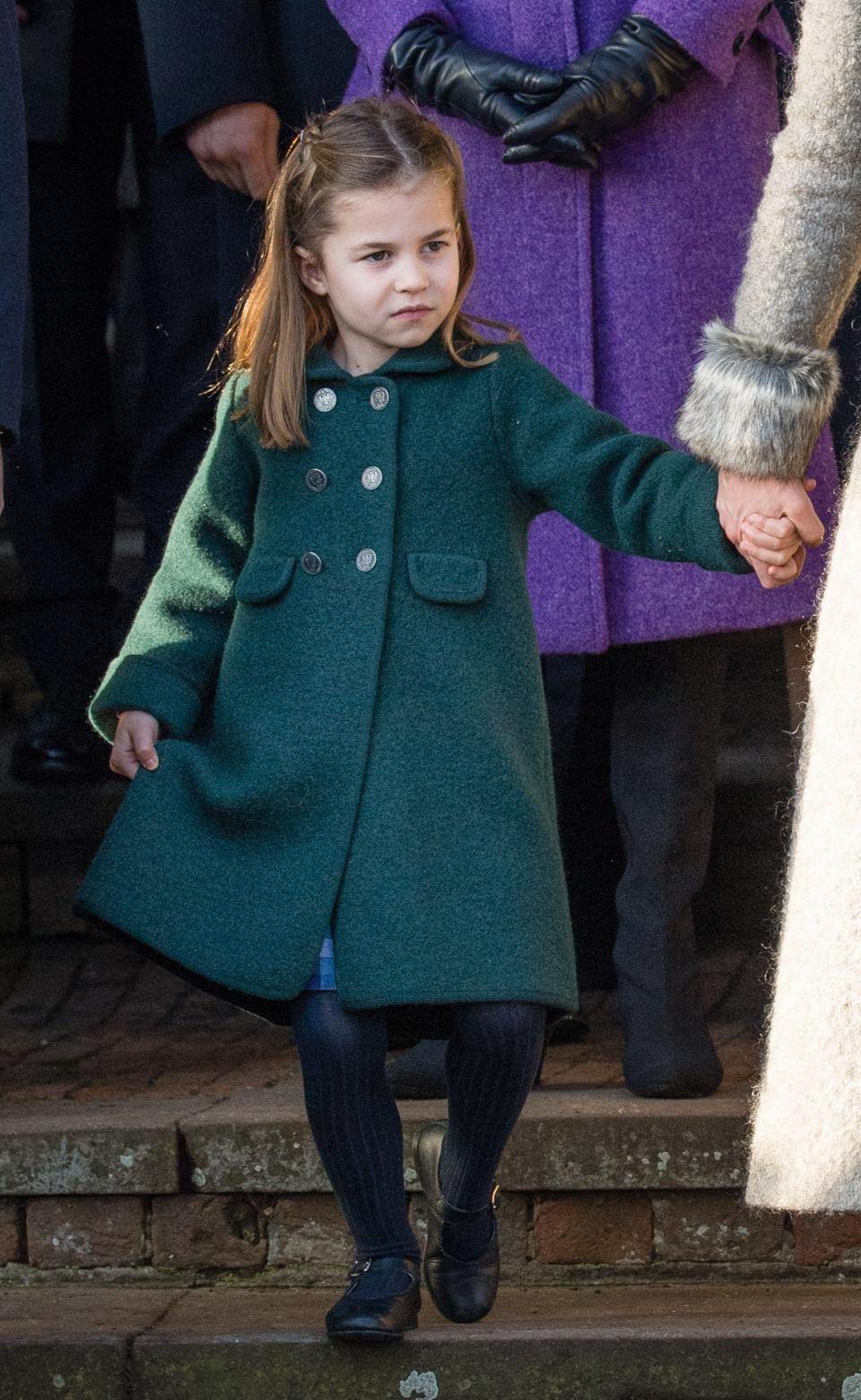 Princess Charlotte tries her hand at a royal curtesy.