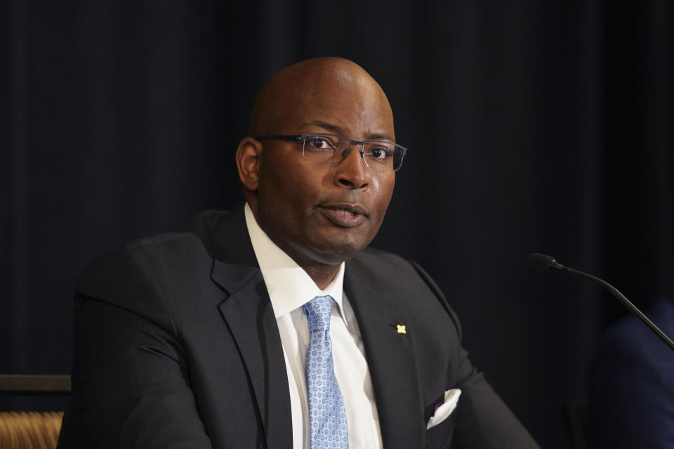 Dr. Airron Richardson addresses the media during a news conference, Wednesday, Aug. 12, 2020, in Novi, Mich. Richardson, is one of several Black former University of Michigan student-athletes who claim they were abused by a sports doctor who worked there for decades. Attorneys are asking the university to treat them fairly as it settles hundreds of lawsuits expected to cost the school millions of dollars. (AP Photo/Carlos Osorio)