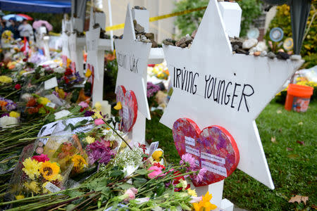 FILE PHOTO: Flowers and other items have been left as memorials outside the Tree of Life synagogue following last Saturday's shooting in Pittsburgh, Pennsylvania, U.S., November 3, 2018. REUTERS/Alan Freed/File Photo