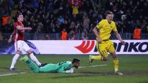 <p>Aleksandr Bukharov celebrates scoring for Rostov</p>