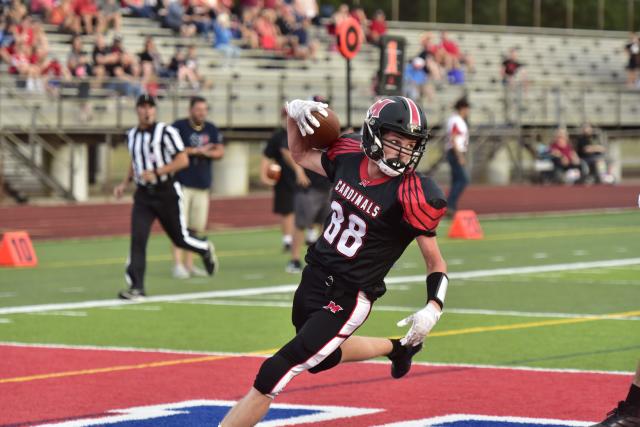 Photos: Cardinal Mooney drops district final to Everest, 42-21