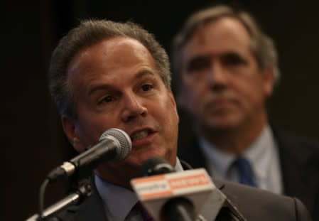 Congressman David Cicilline talks to reporters during a news conference at a hotel in Yangon