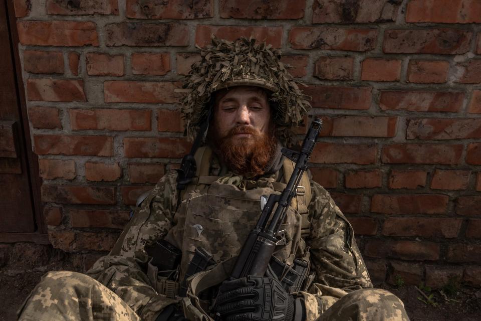 ​​A Ukrainian infantry soldier of the 23rd Mechanised Brigade waits to head toward the frontline in the Avdiivka direction (AFP via Getty Images)